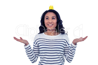 Smiling Asian woman with paper crown
