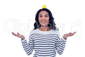 Smiling Asian woman with paper crown