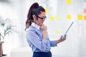 Asian businesswoman using tablet