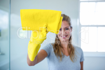 Woman cleaning the bathroom