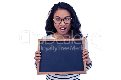 Pretty Asian woman holding blackboard