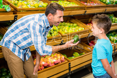 Father and son doing shopping