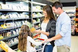 Happy family doing shopping