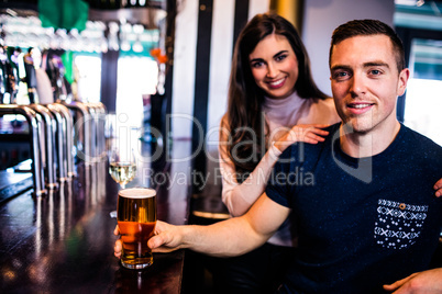 Cute couple having a drink