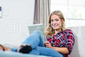 Woman using tablet computer