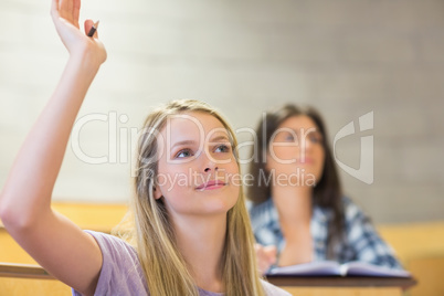 Students sitting beside each other while learning