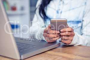 Close up of woman using smartphone