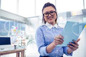 Asian businesswoman using tablet