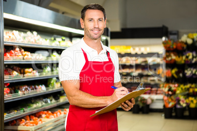 Male worker with clipboard