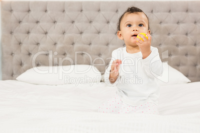 Cute baby playing with ball