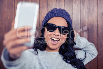 Asian woman taking selfie