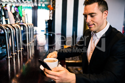 Businessman having a coffee