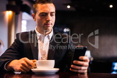 Businessman having a coffee