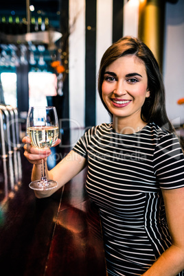 Portrait of woman holding a glass of wine