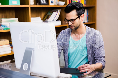 Serious designer using tablet graphic