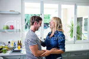 Cute couple dancing and laughing