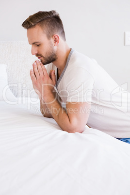 Concentrated man praying