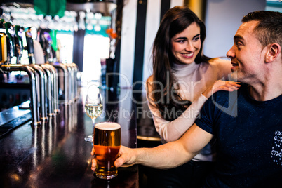 Cute couple having a drink