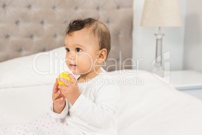 Cute baby playing with ball