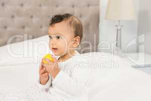 Cute baby playing with ball