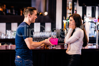 Man giving a present to his girlfriend