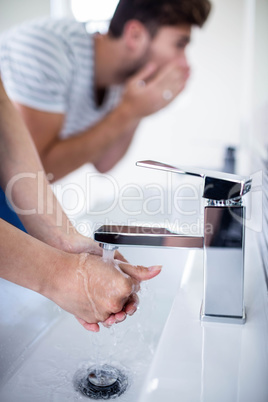 Young couple in bathroom