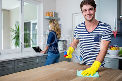 Cute couple cleaning up
