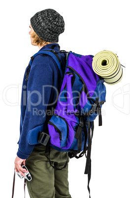 Side view of backpacker hipster