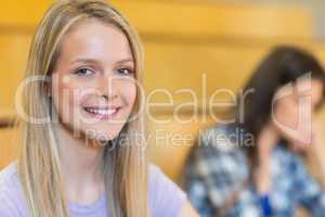 Portrait of smiling student in class