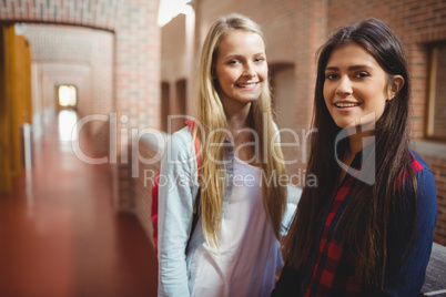 Smiling students in the hallway
