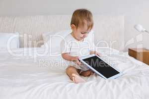 Cute baby using tablet