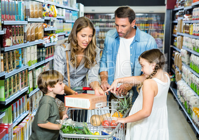 Happy family doing shopping