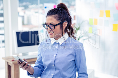 Asian businesswoman using smartphone