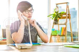 Focused asian businessman phone calling