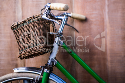 Close up view of a old green bike
