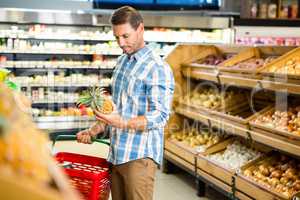 Young man doing shopping