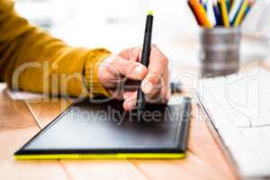 Close up view of businessman using tablet graphic