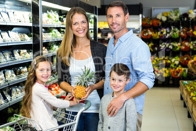 Portrait of family doing shopping