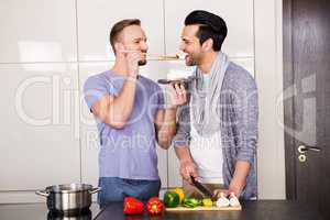 Smiling man tasting food