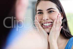 Smiling brunette in bathroom