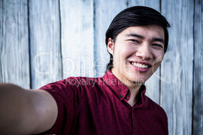 Hipster man taking a selfie