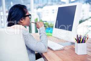 Asian businesswoman using computer