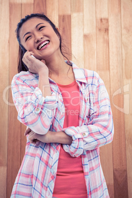 Happy Asian woman on phone call