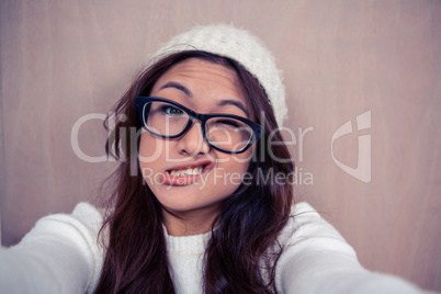 Asian woman making faces