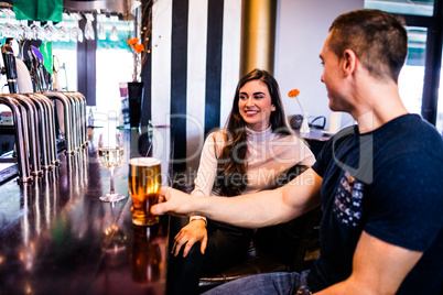 Cute couple having a drink