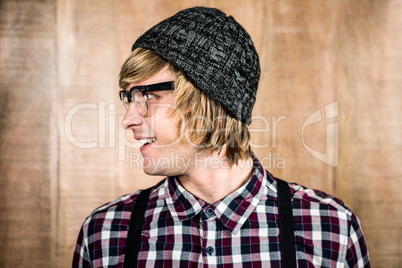 Side view of Happy blond hipster smiling