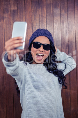 Asian woman taking selfie