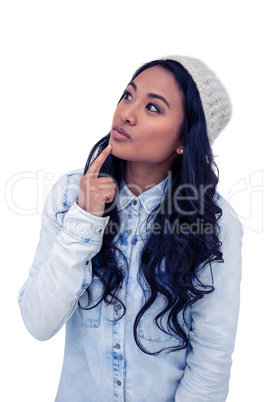 Asian woman with finger on chin