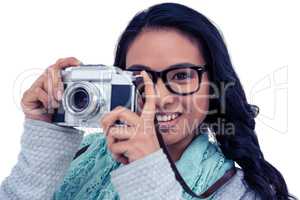 Asian woman taking picture with digital camera