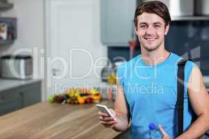 Healthy man sending text messages